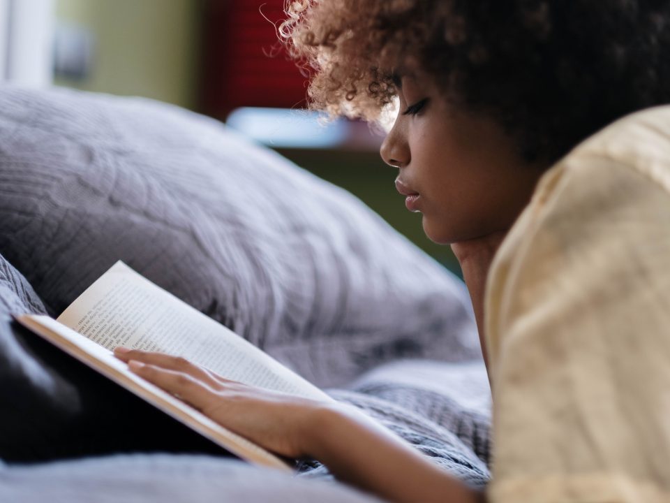 Young adult reading in solitude